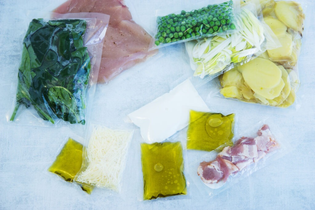 Various packaged components of a meal kit