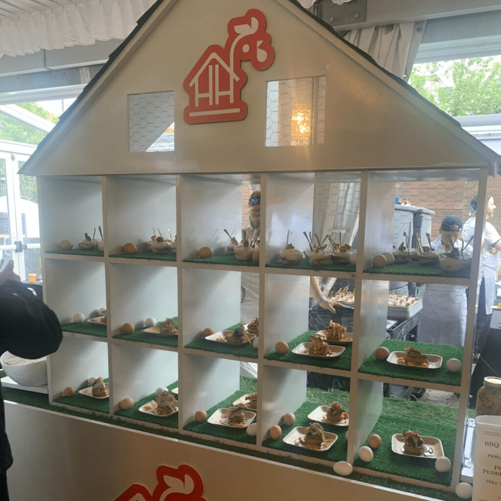 The Hen House displayed samples in coop-shaped shelving unit