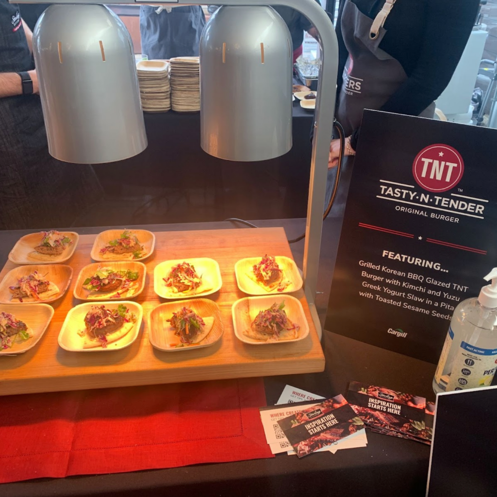 TNT Burgers displayed their samples on a butcher block